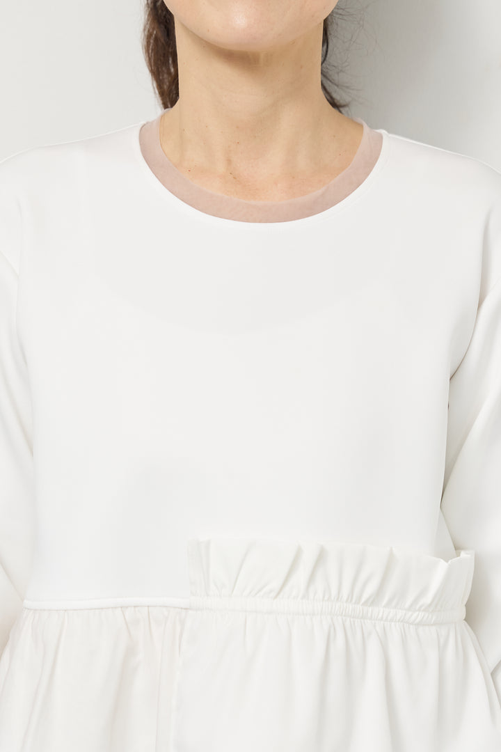 ストレッチポンチペプラムトップス