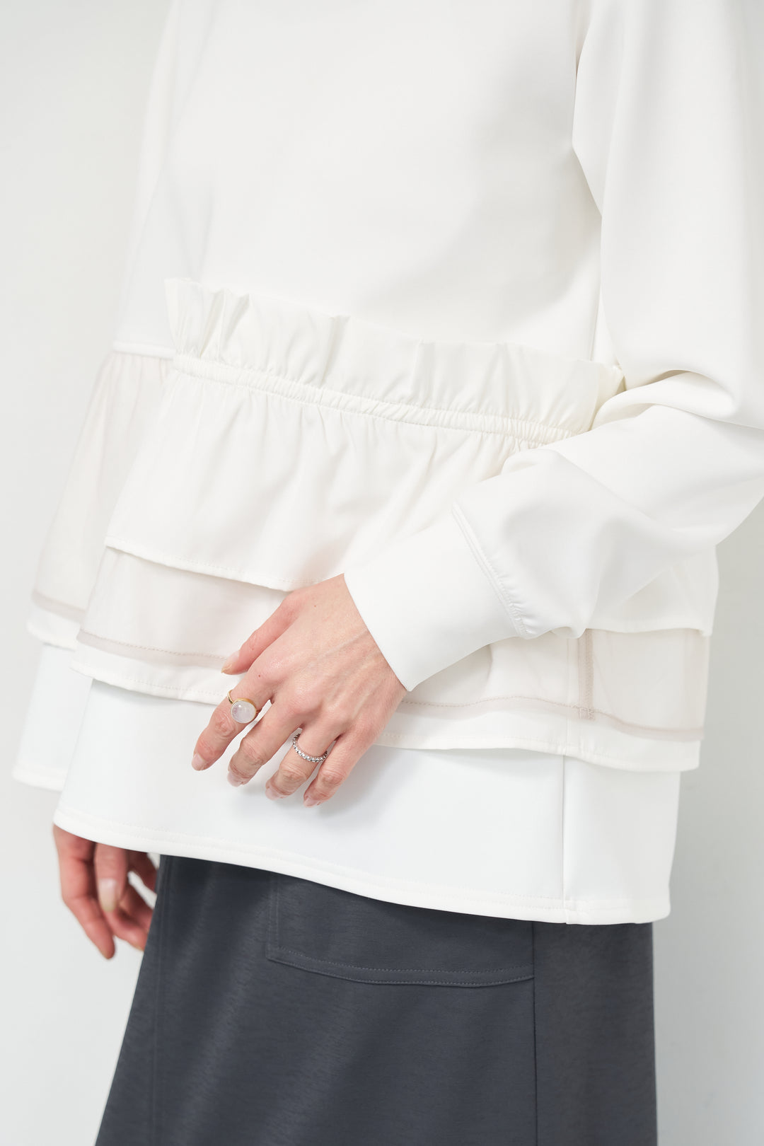 ストレッチポンチペプラムトップス