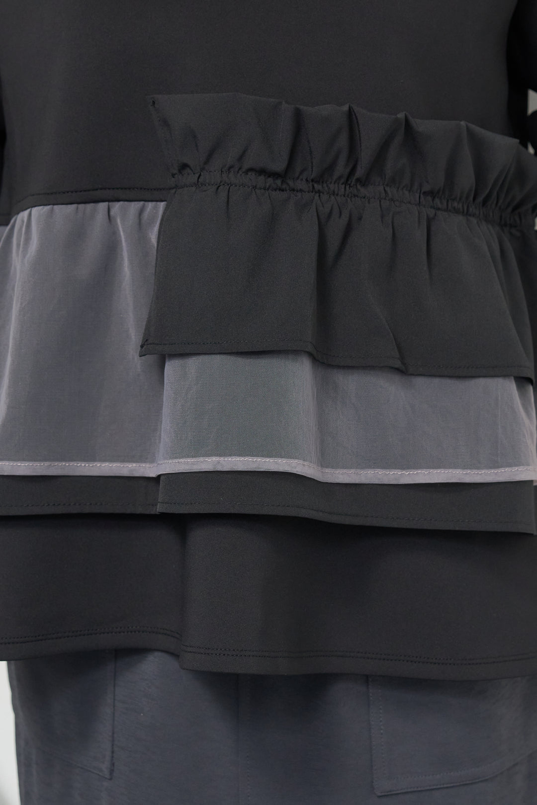 ストレッチポンチペプラムトップス