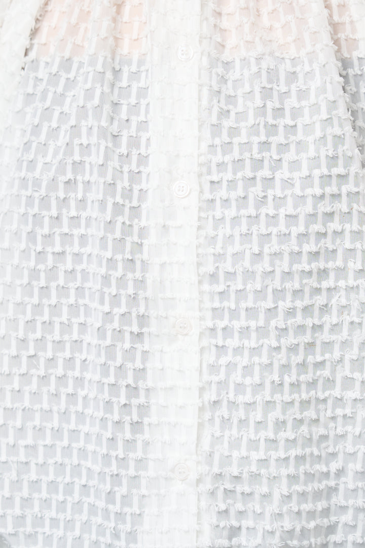 シアーフリンジブラウス