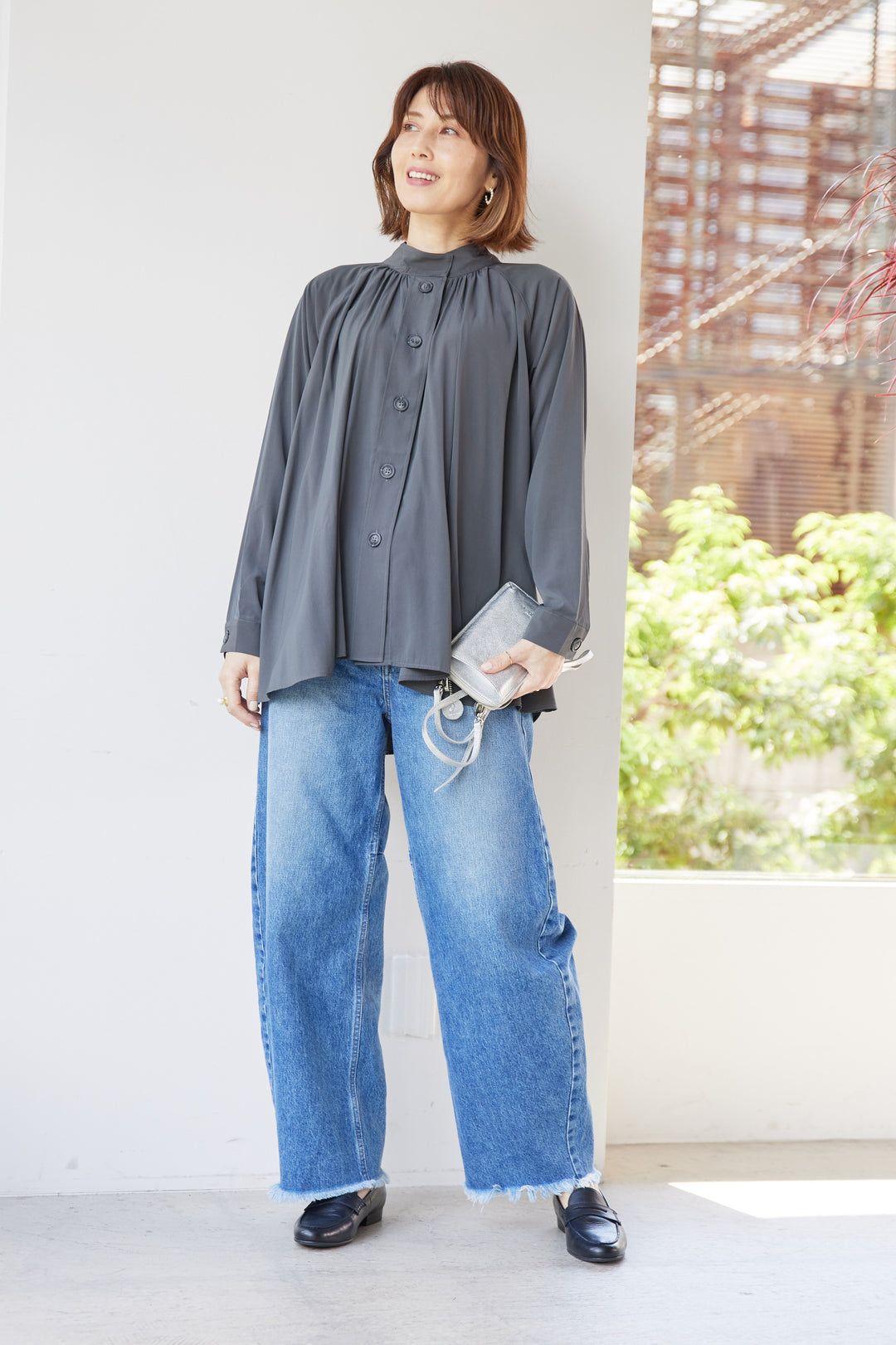 Gathered stand-up neck blouse
