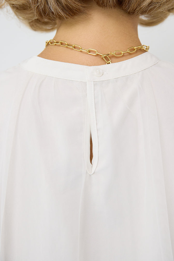 チュールレイヤードブラウス