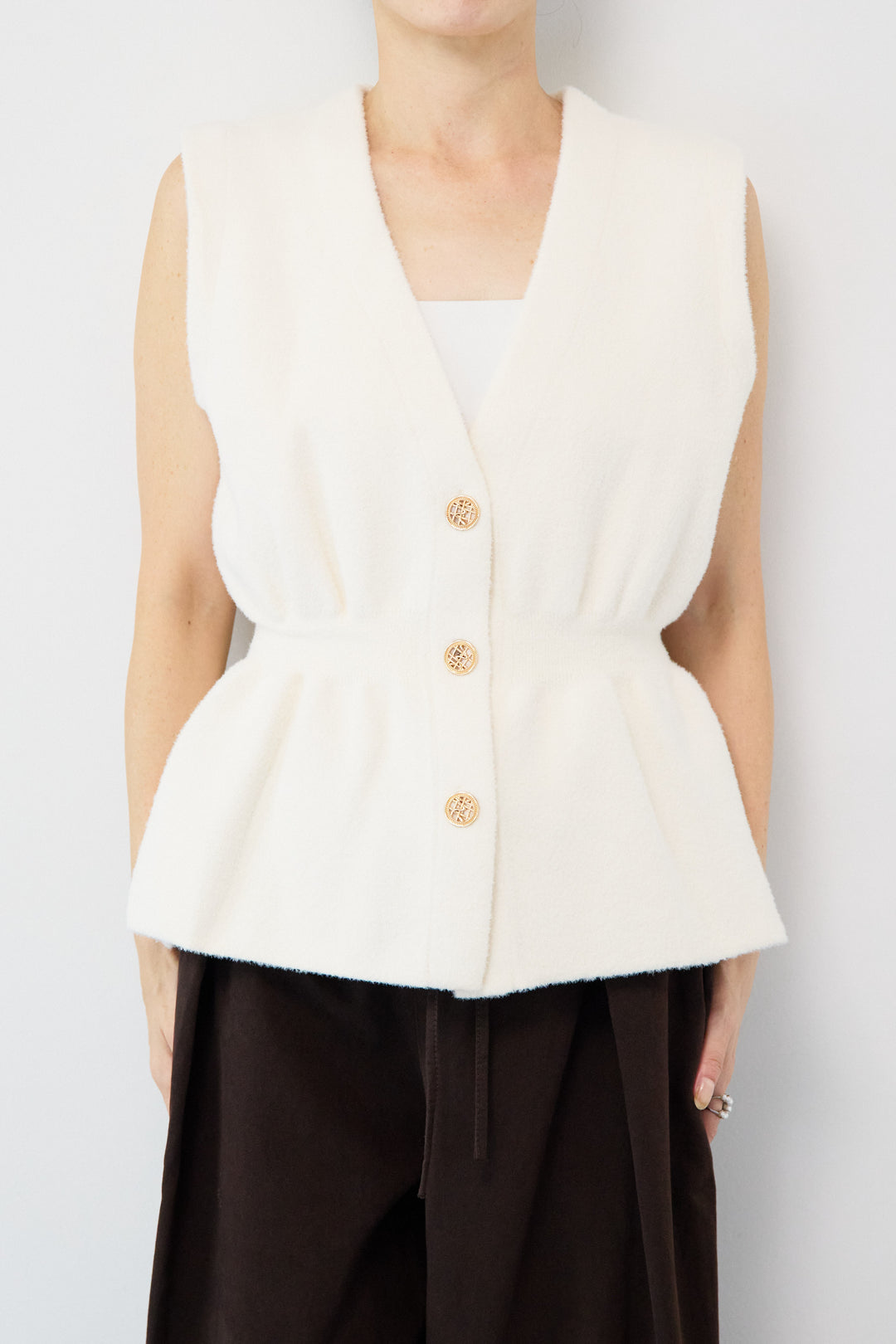 ペプラムニットベスト