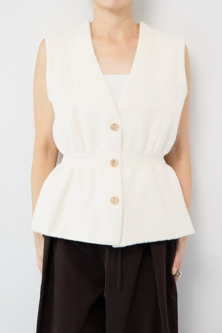 ペプラムニットベスト