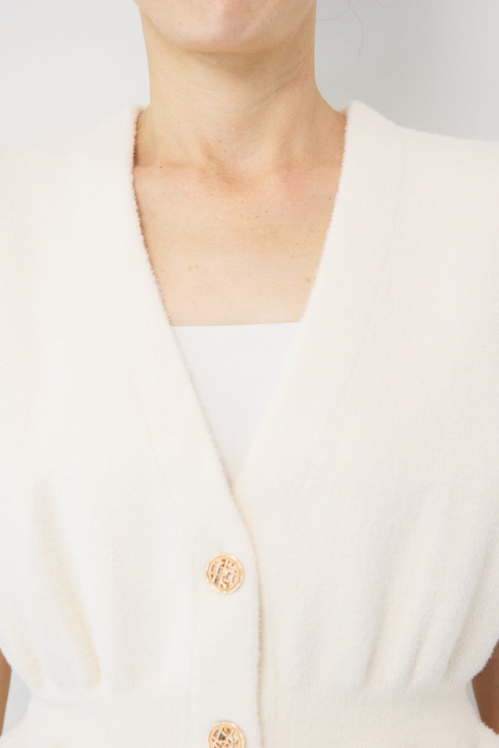 ペプラムニットベスト