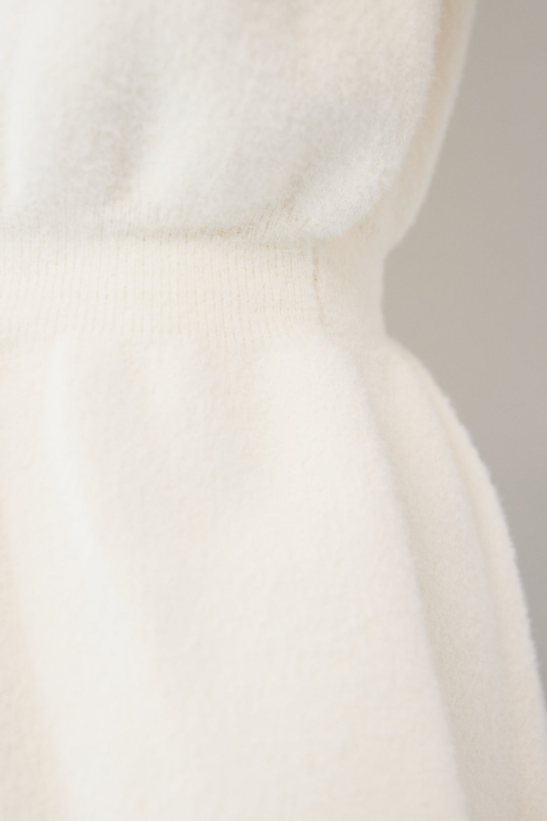 ペプラムニットベスト