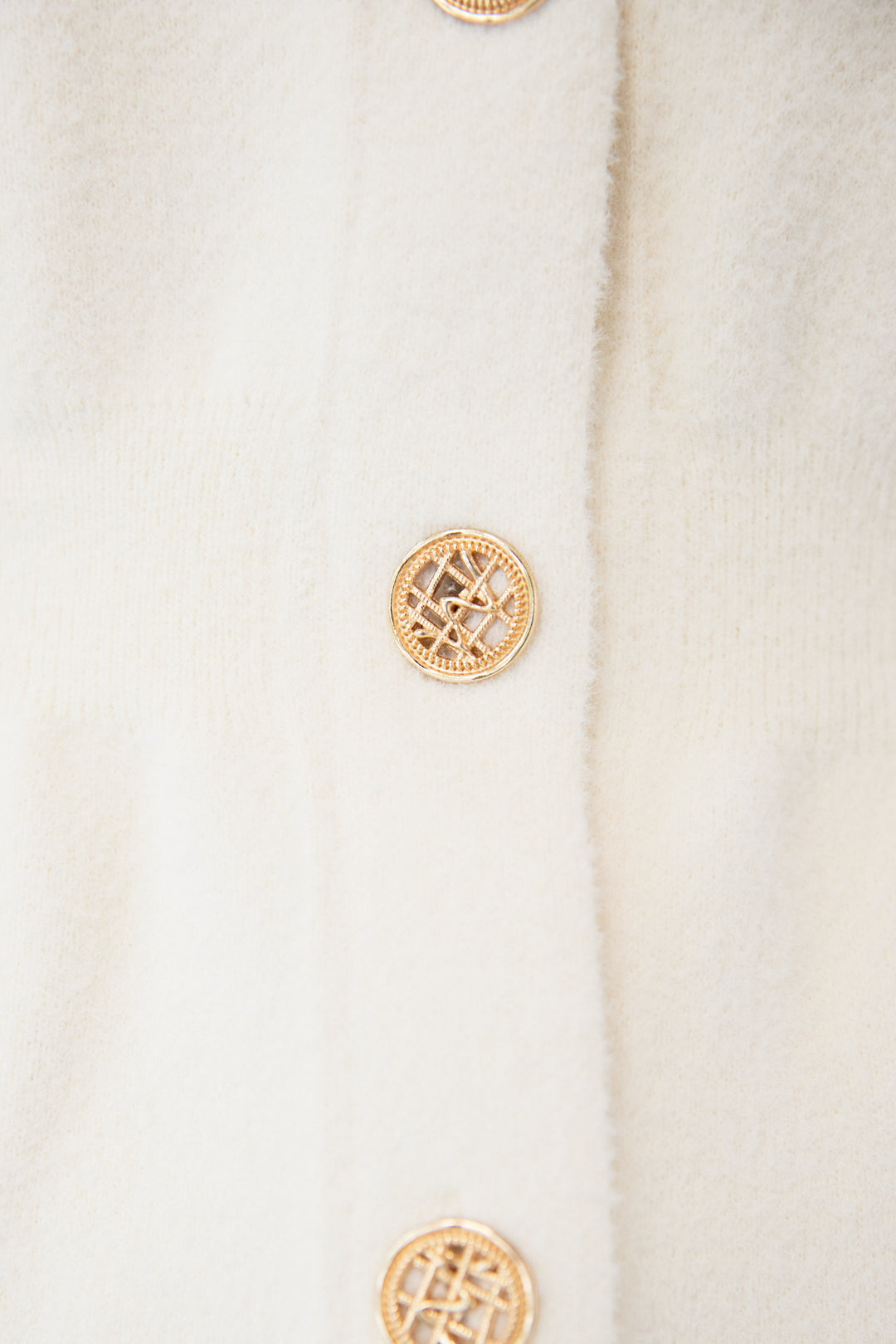 ペプラムニットベスト