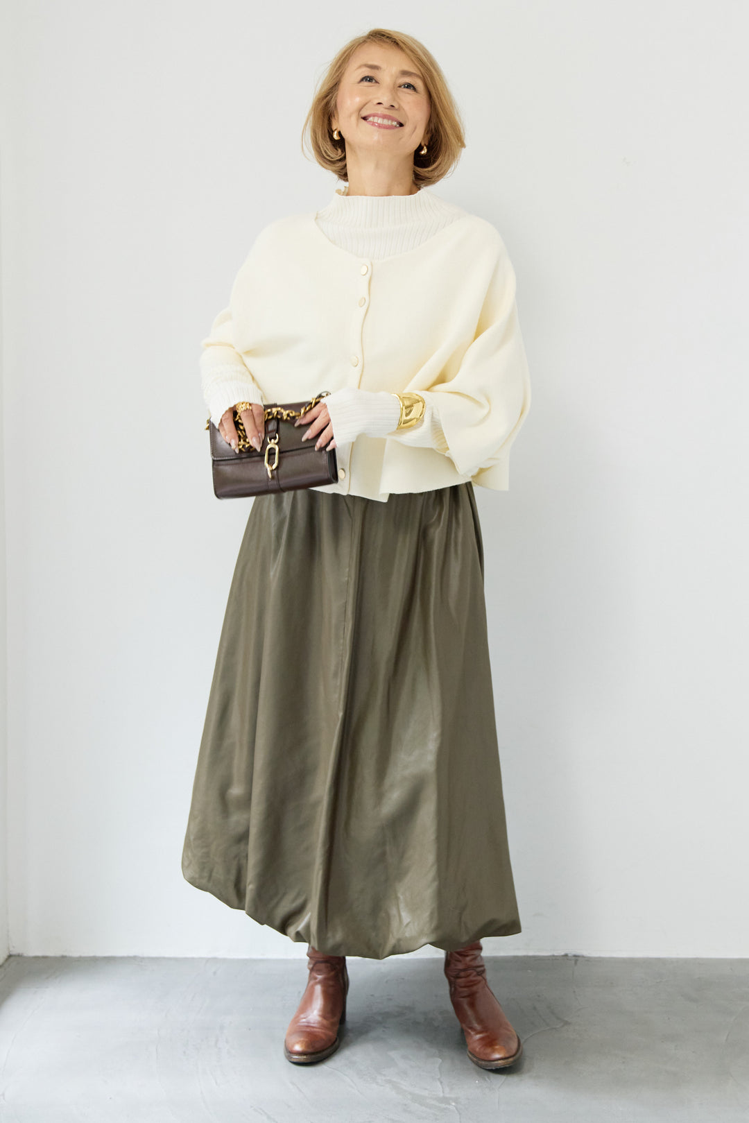 ケープアンサンブルニット