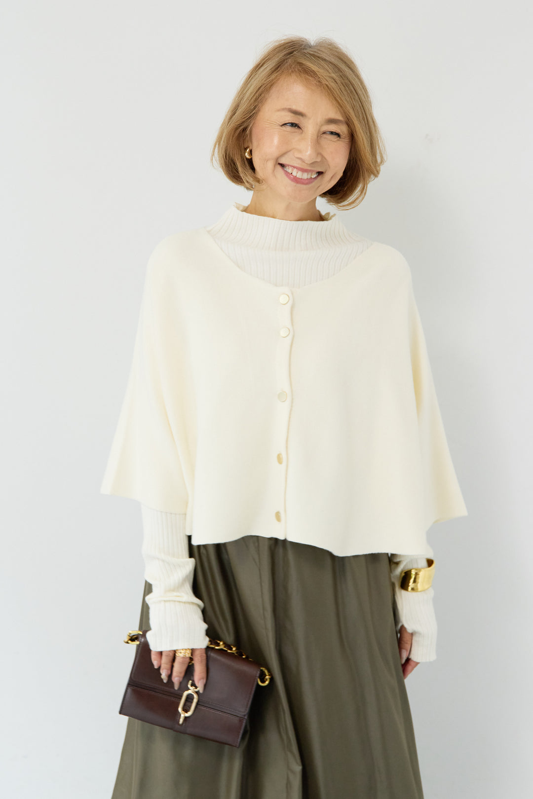 ケープアンサンブルニット