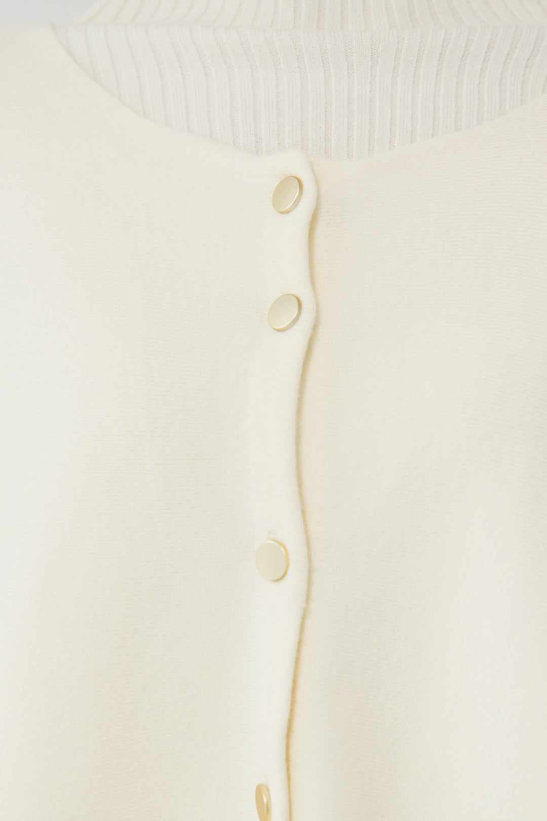 ケープアンサンブルニット