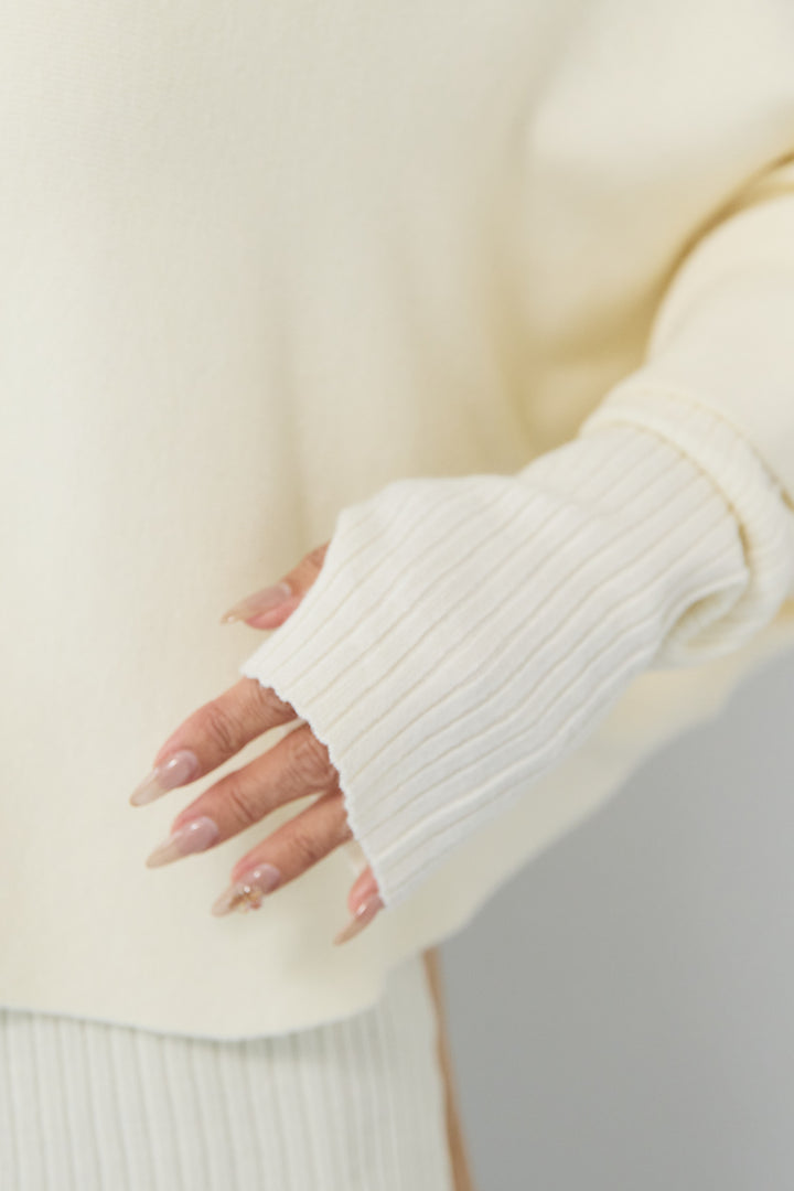 ケープアンサンブルニット