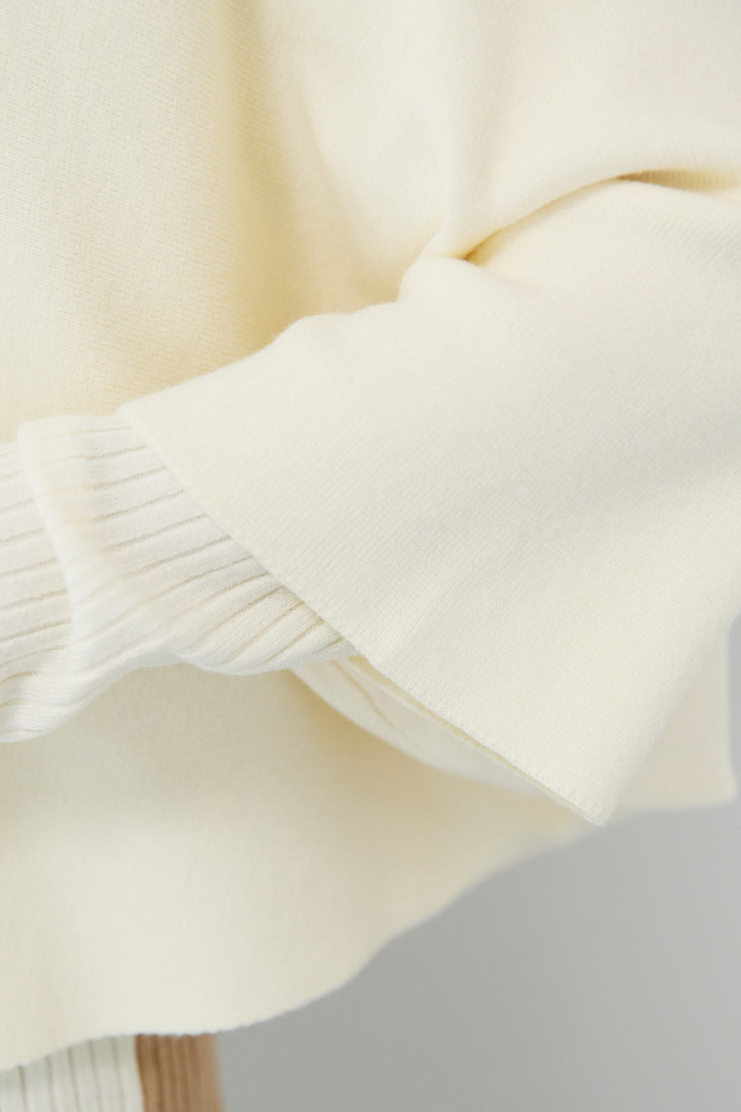 ケープアンサンブルニット