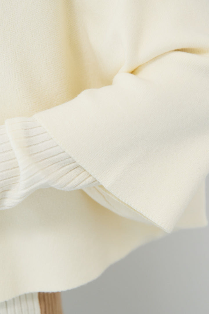 ケープアンサンブルニット