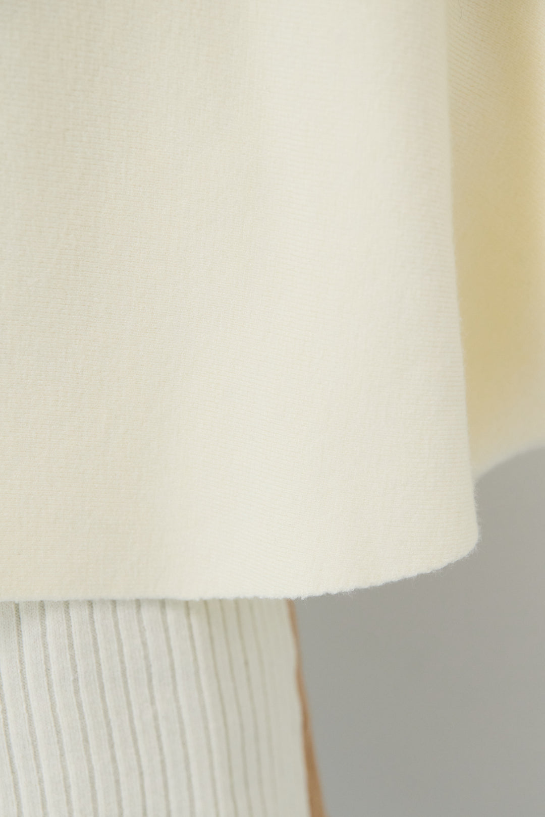 ケープアンサンブルニット