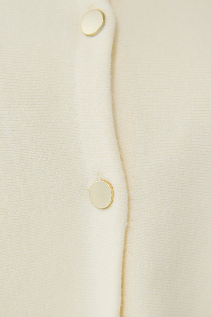 ケープアンサンブルニット