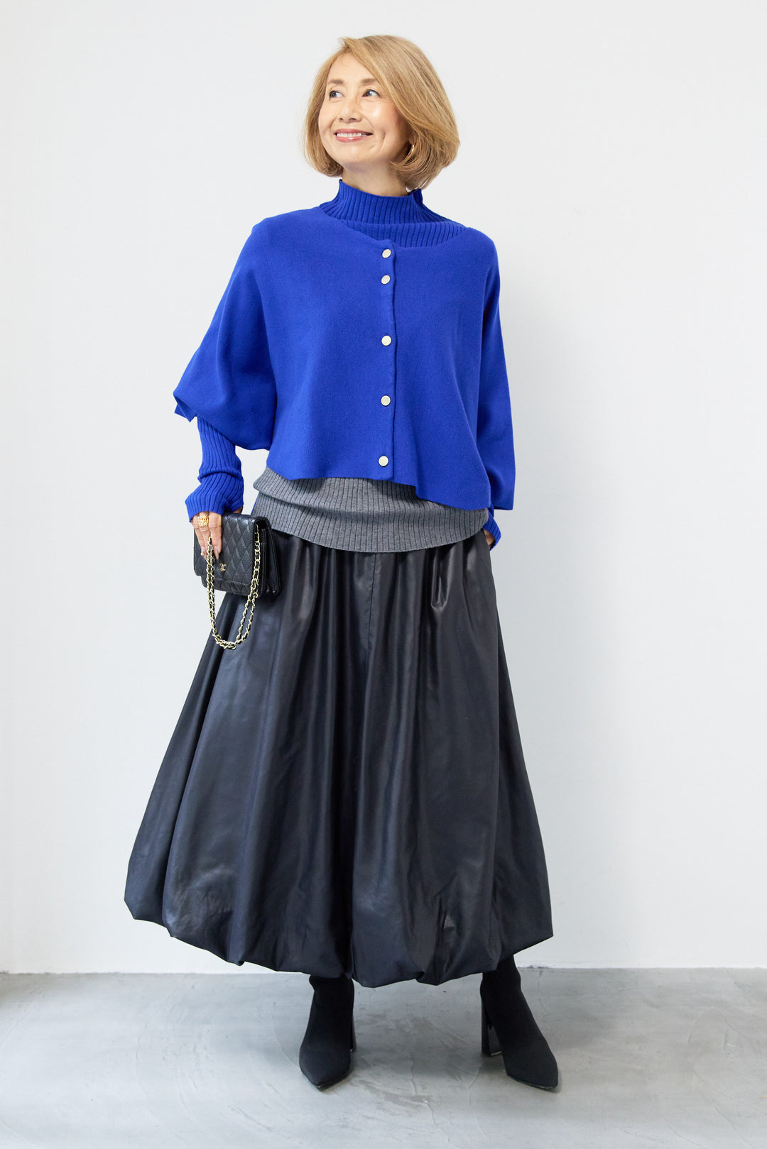 ケープアンサンブルニット