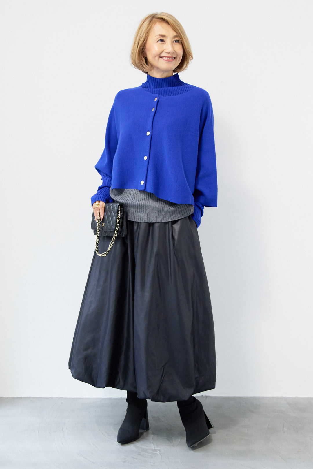 ケープアンサンブルニット