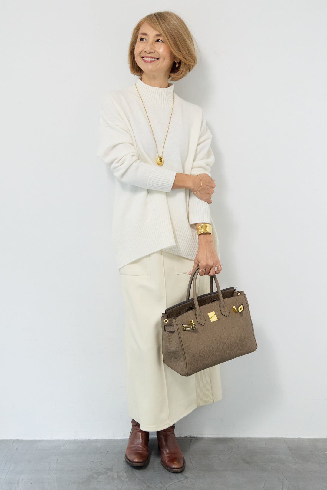 襟スリットハイネック山形ウールニット