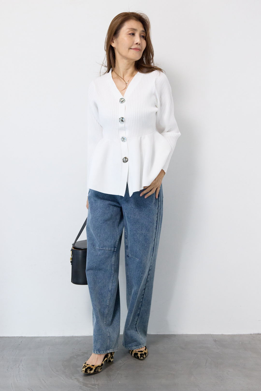 ニュアンス釦ペプラムニットカーディガン