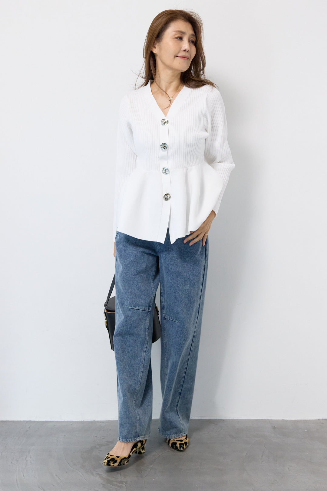 ニュアンス釦ペプラムニットカーディガン