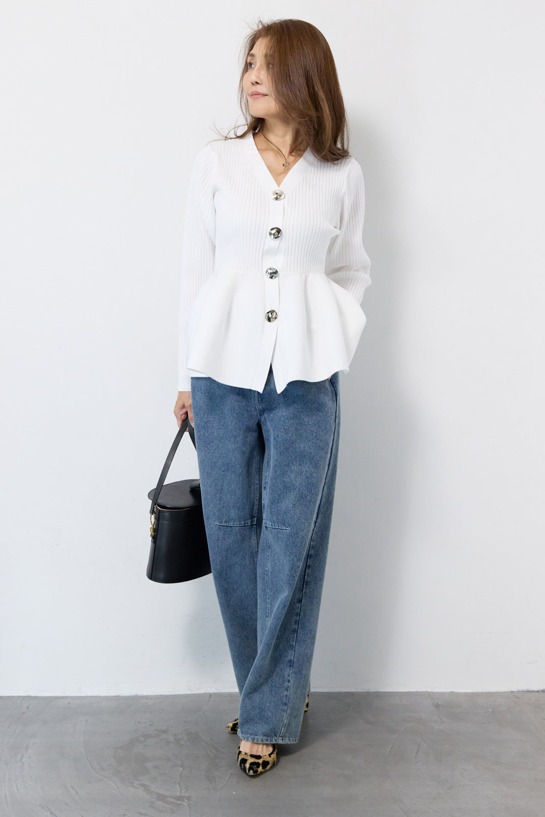 ニュアンス釦ペプラムニットカーディガン