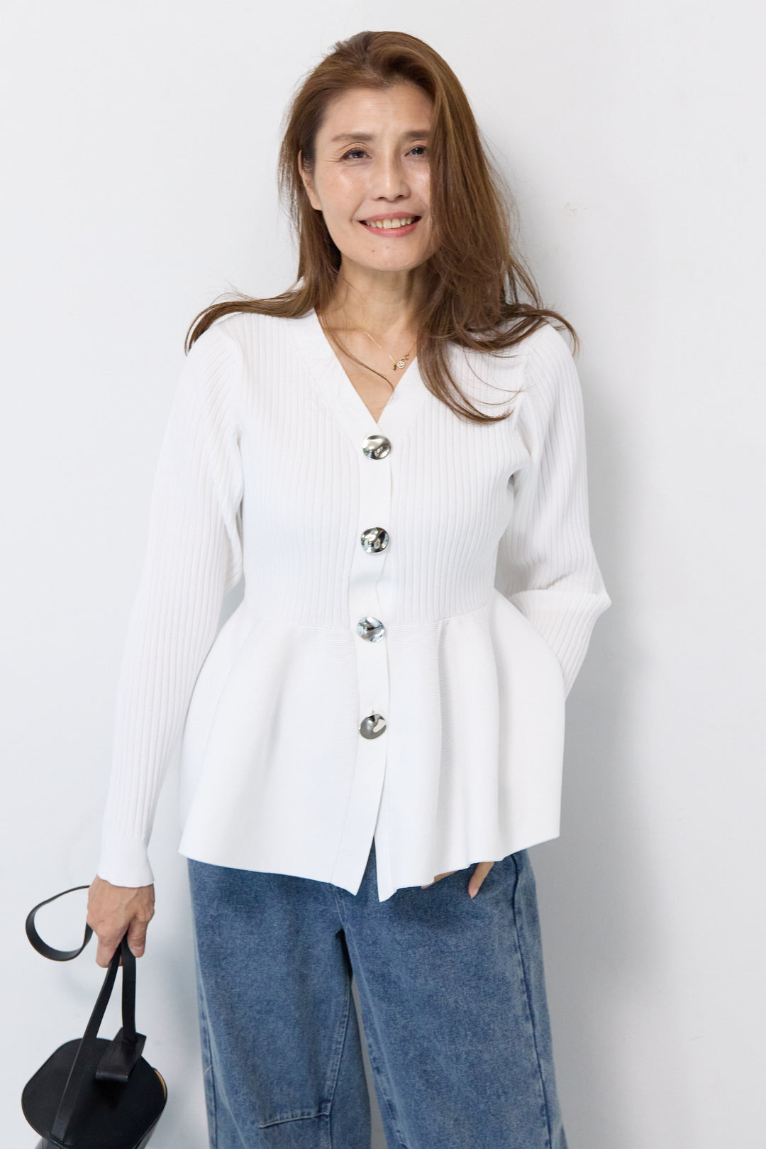 ニュアンス釦ペプラムニットカーディガン