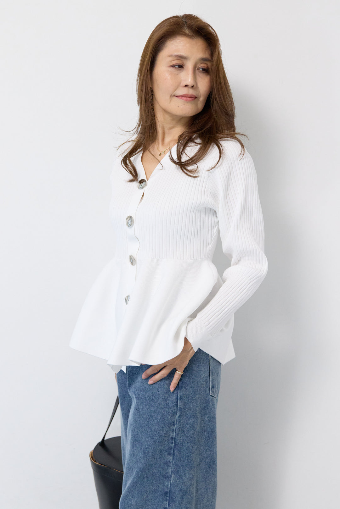 ニュアンス釦ペプラムニットカーディガン