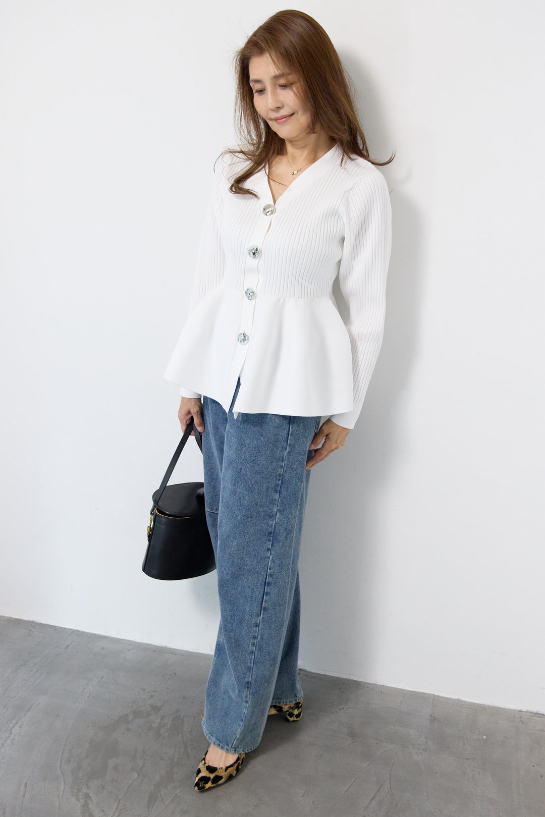 ニュアンス釦ペプラムニットカーディガン