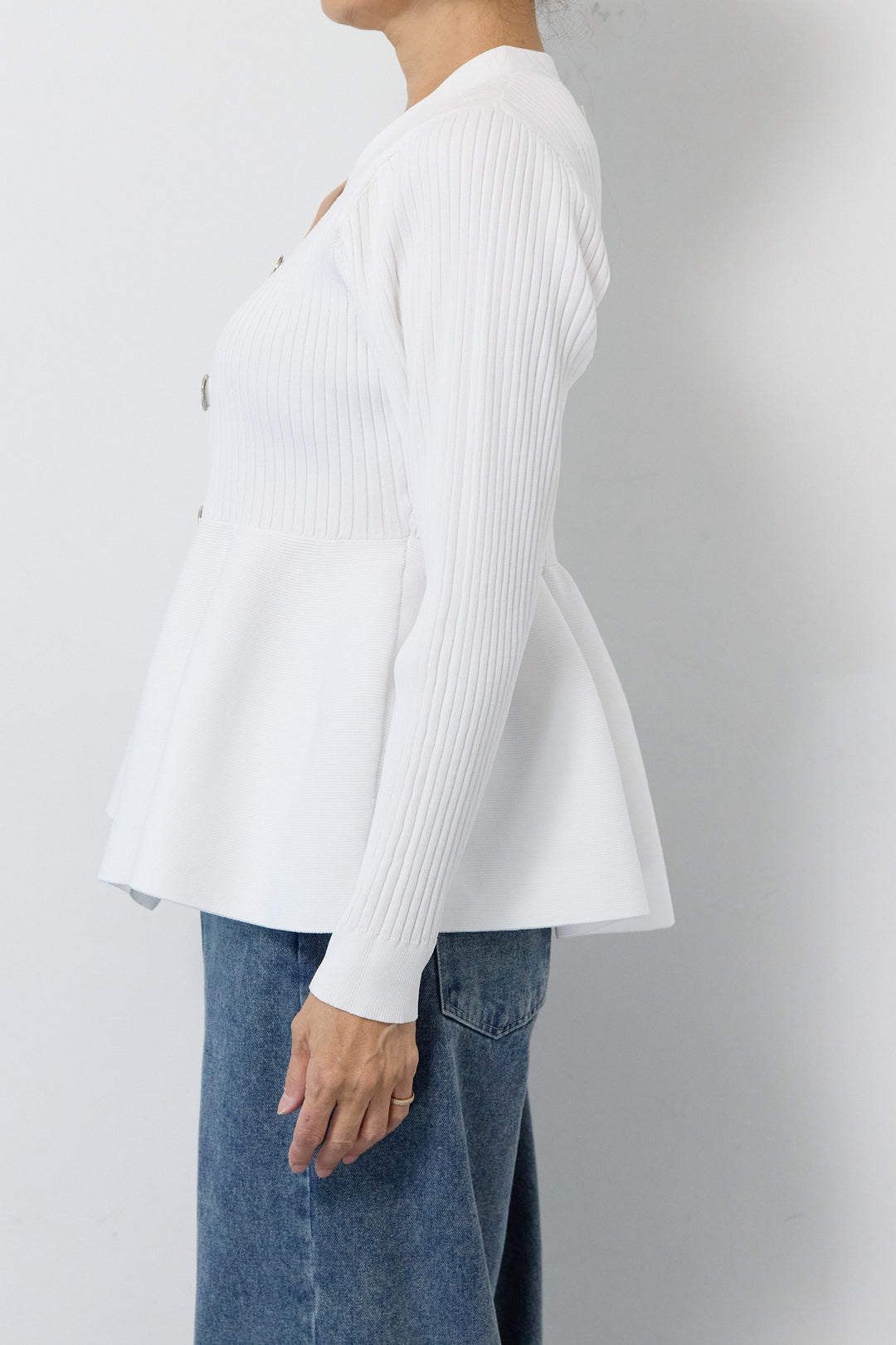 ニュアンス釦ペプラムニットカーディガン