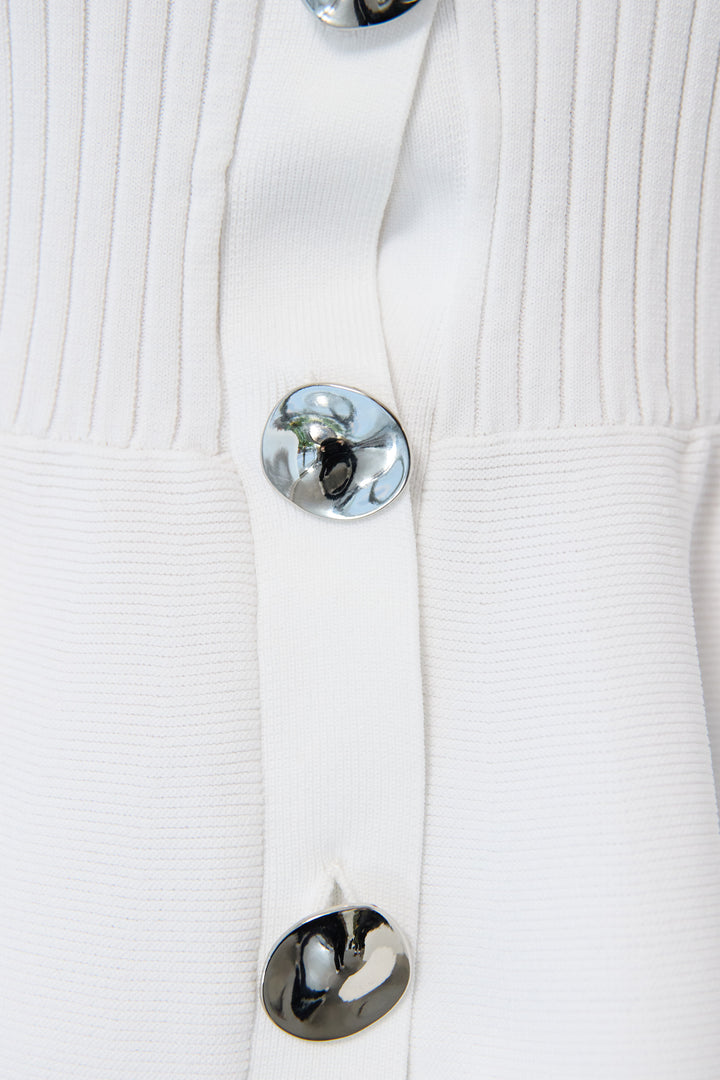 ニュアンス釦ペプラムニットカーディガン