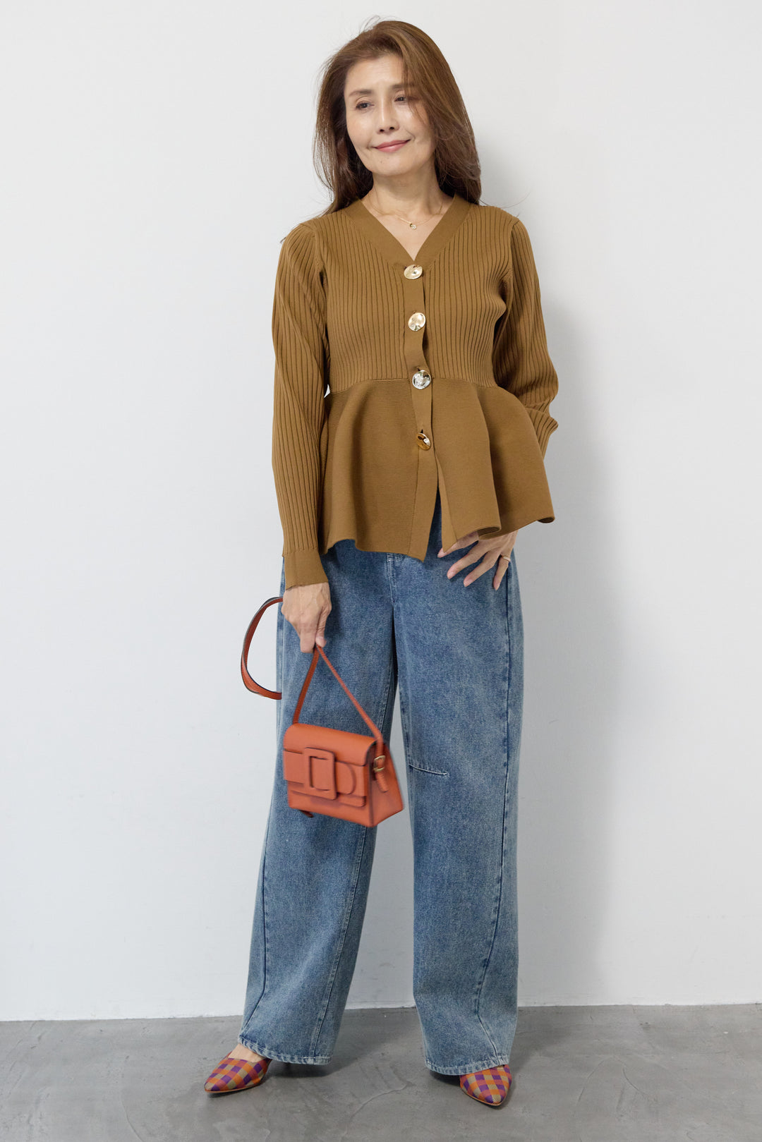 ニュアンス釦ペプラムニットカーディガン