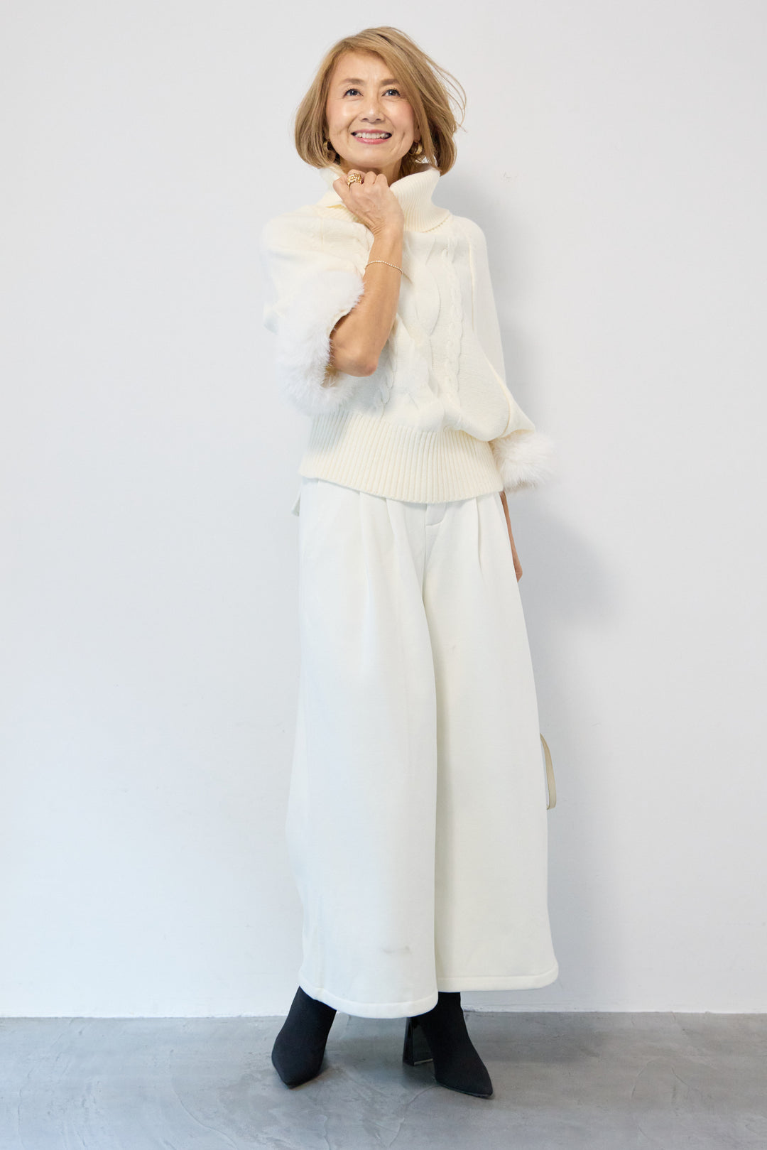 袖ファーケーブルニット ポンチョ