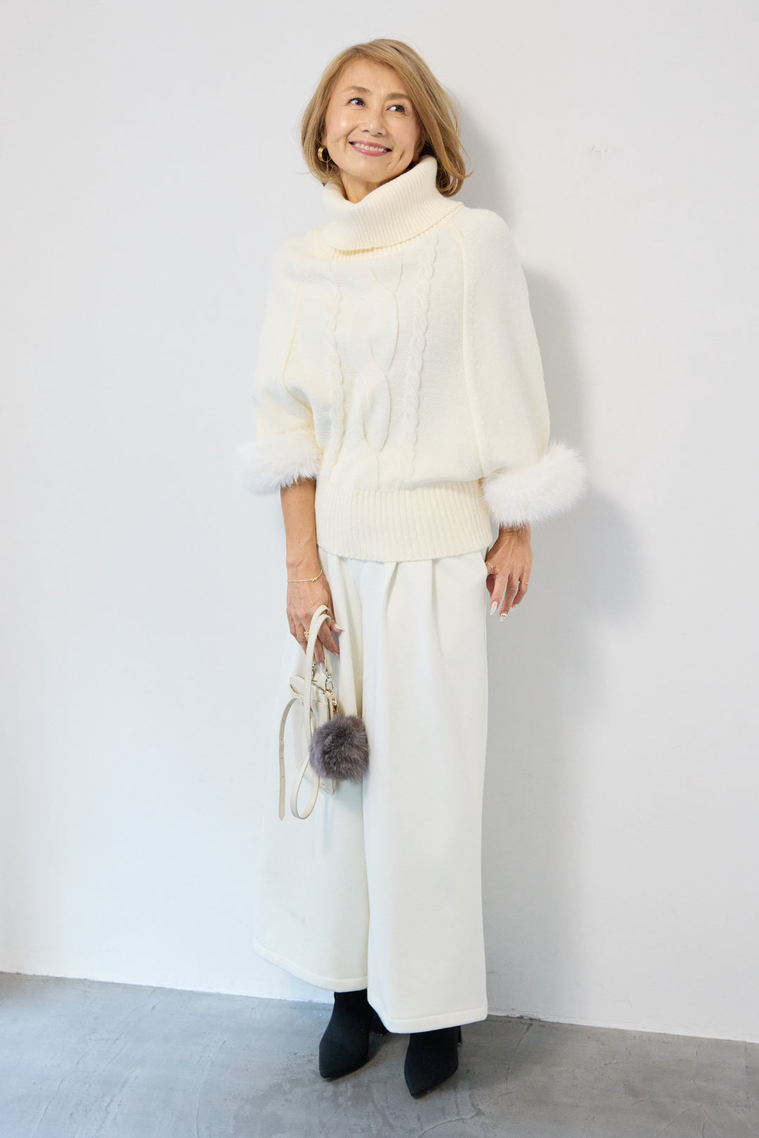 袖ファーケーブルニット ポンチョ