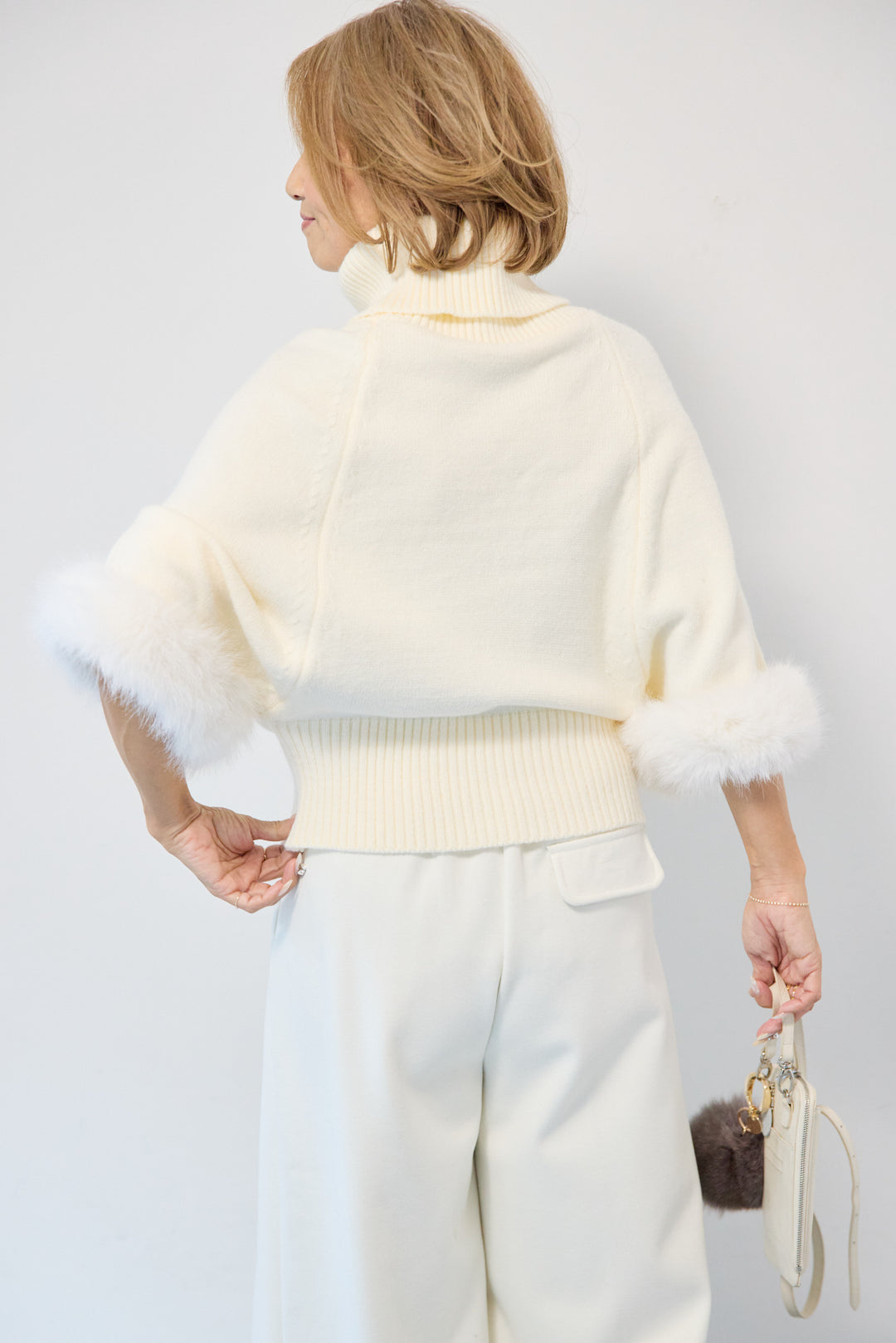 袖ファーケーブルニット ポンチョ