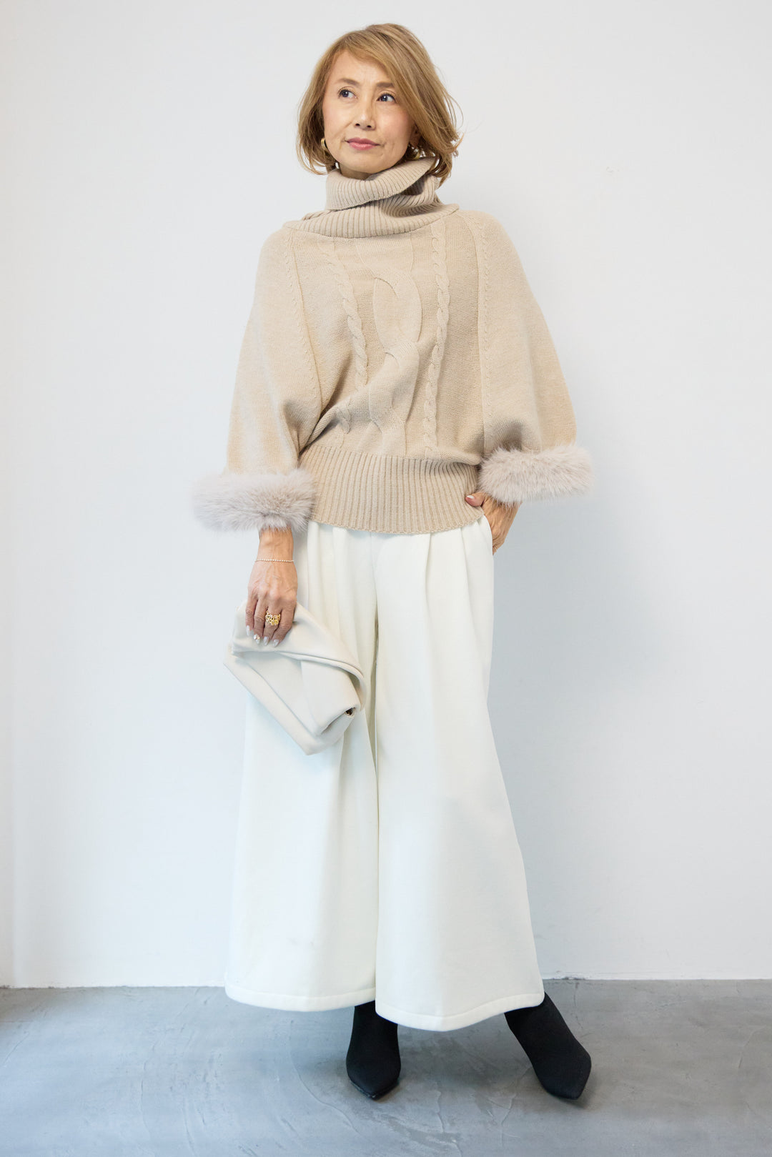 袖ファーケーブルニット ポンチョ