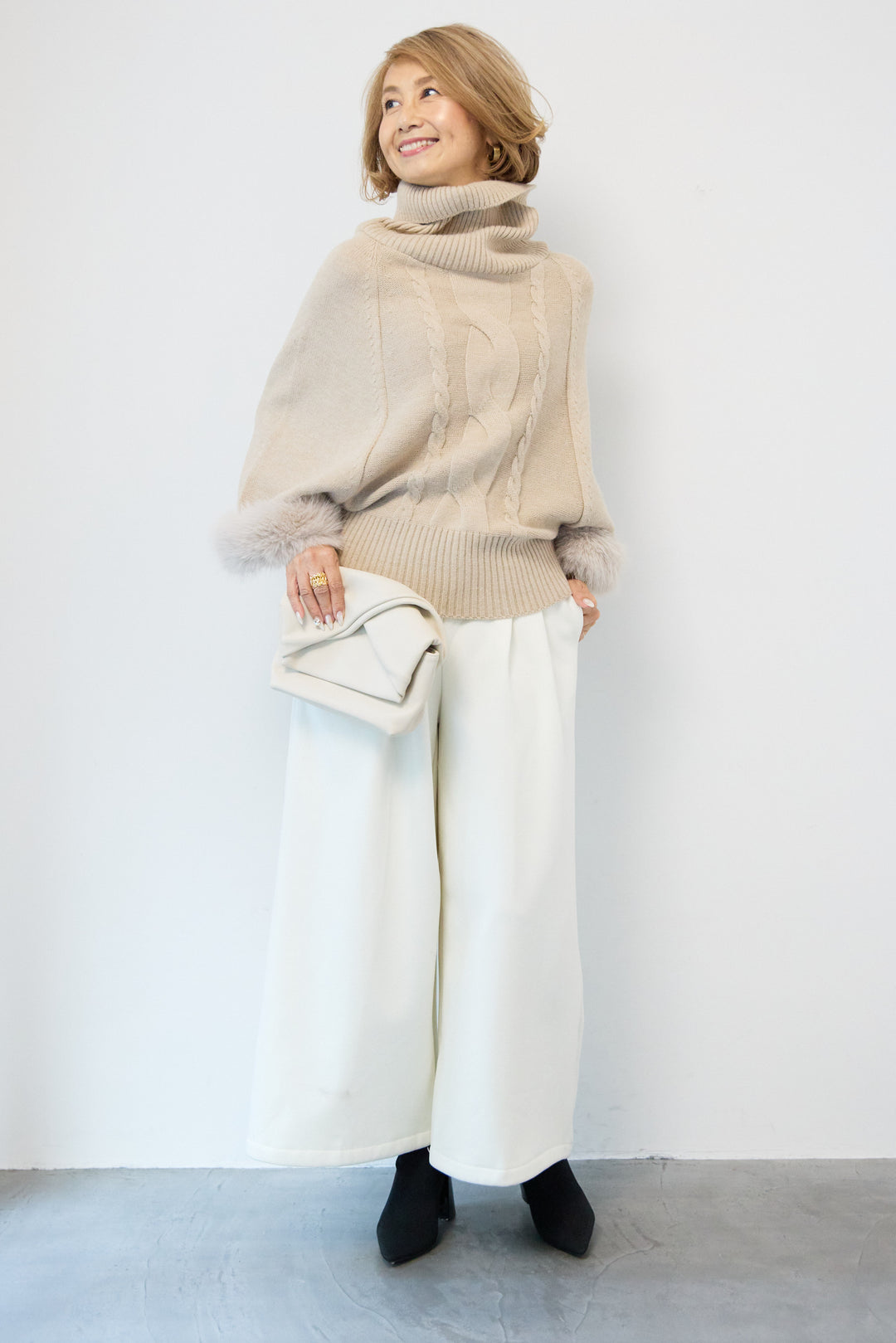 袖ファーケーブルニット ポンチョ