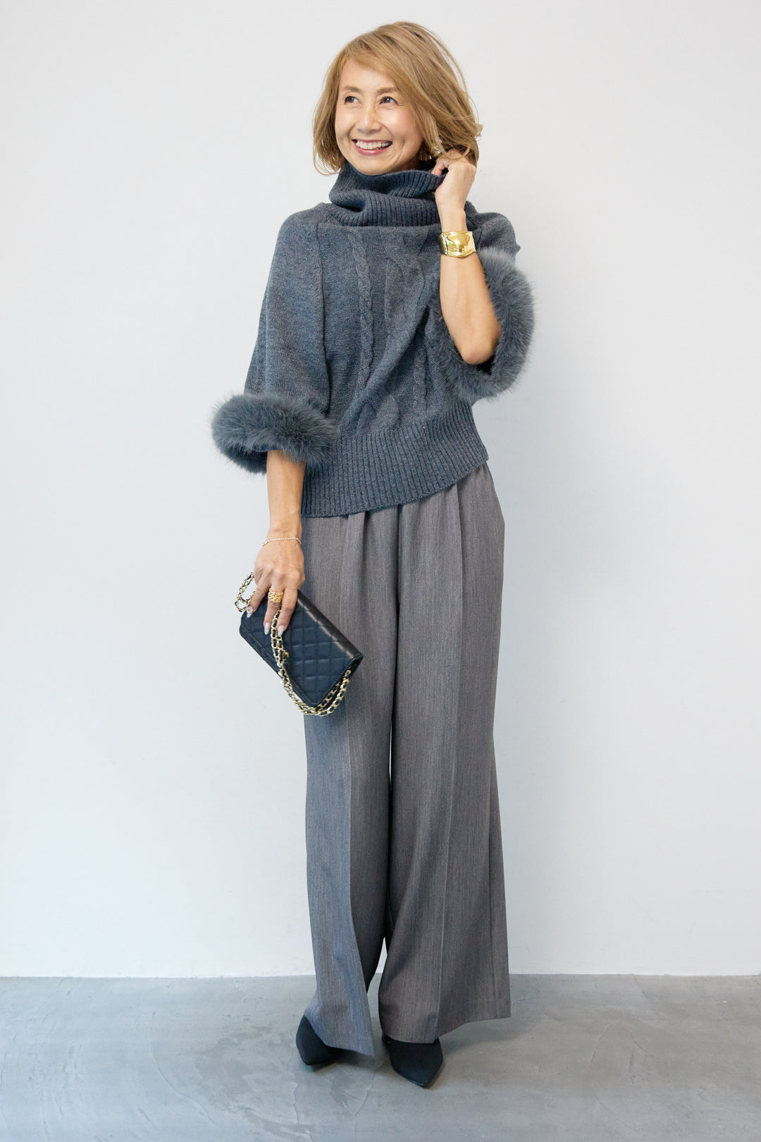 袖ファーケーブルニット ポンチョ