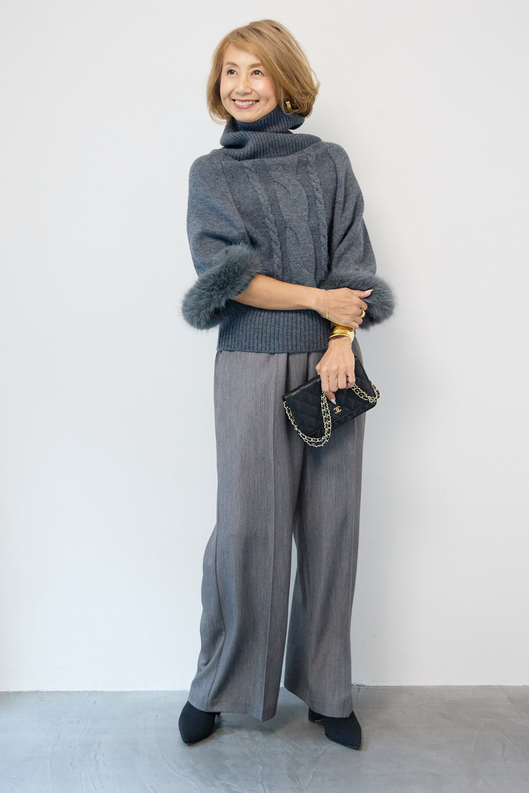 袖ファーケーブルニット ポンチョ