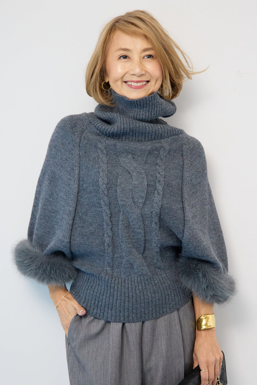 袖ファーケーブルニット ポンチョ