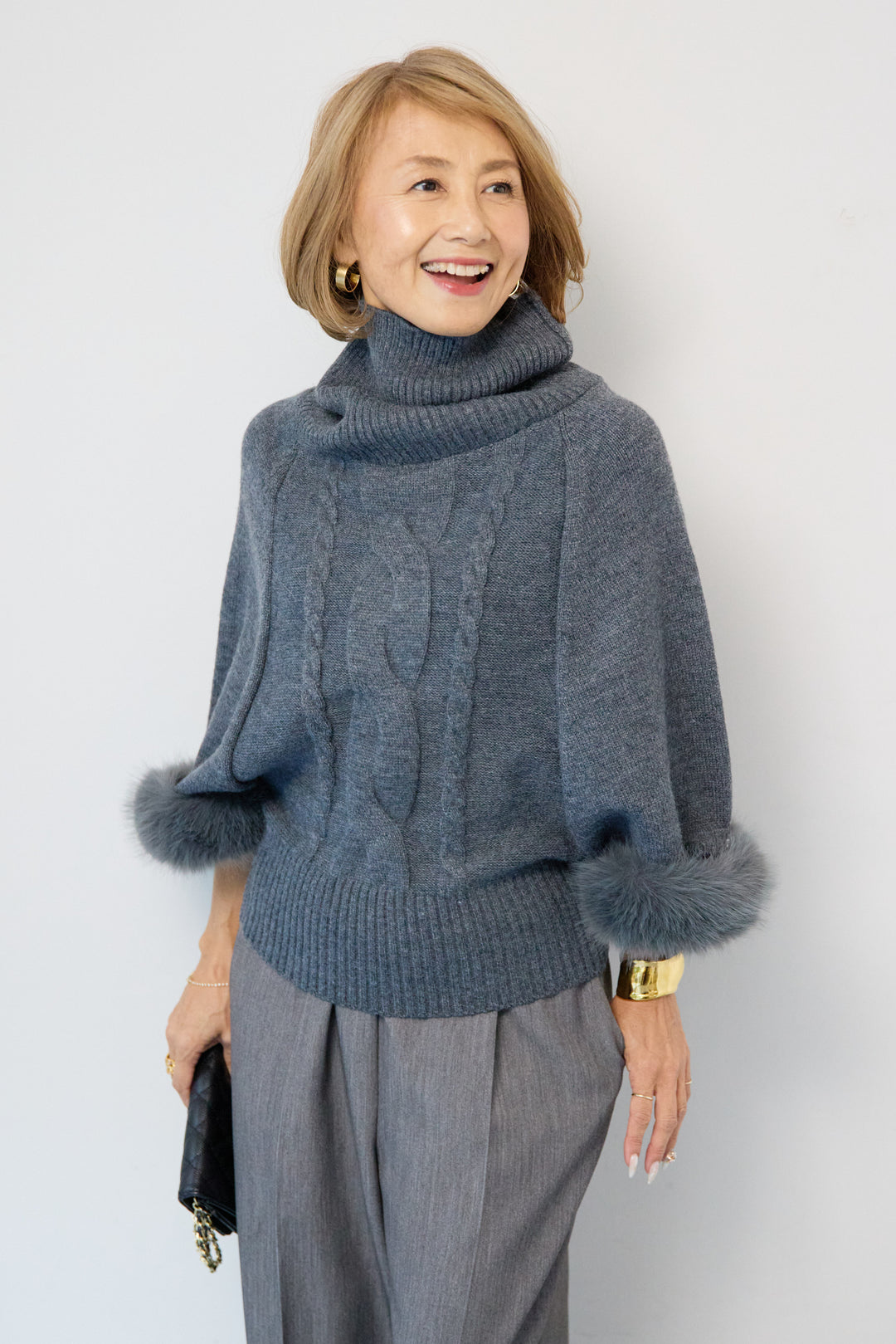 袖ファーケーブルニット ポンチョ