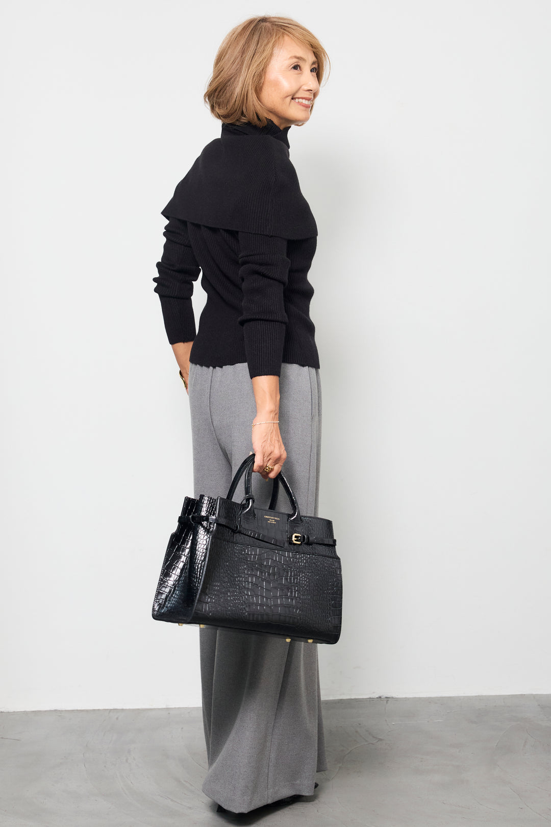 ボタンデザインケープニットアンサンブル