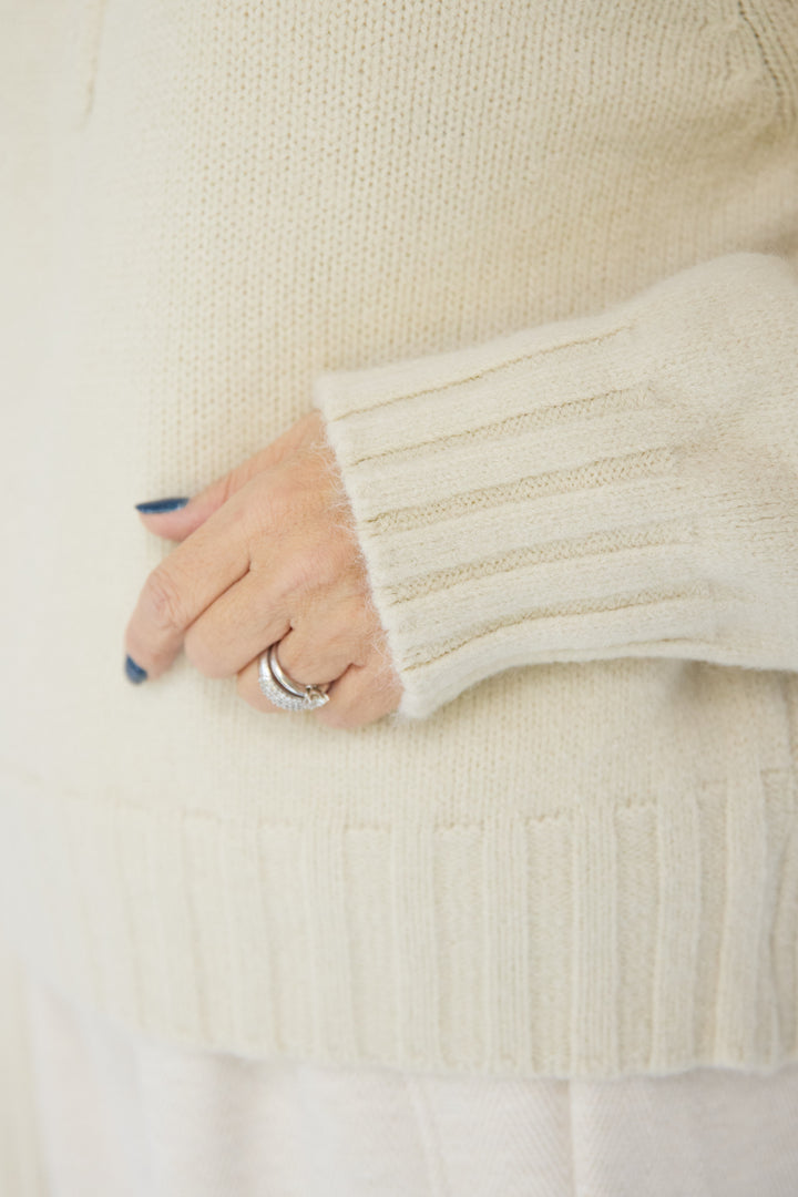 ラグランスリーブハーフジップニット