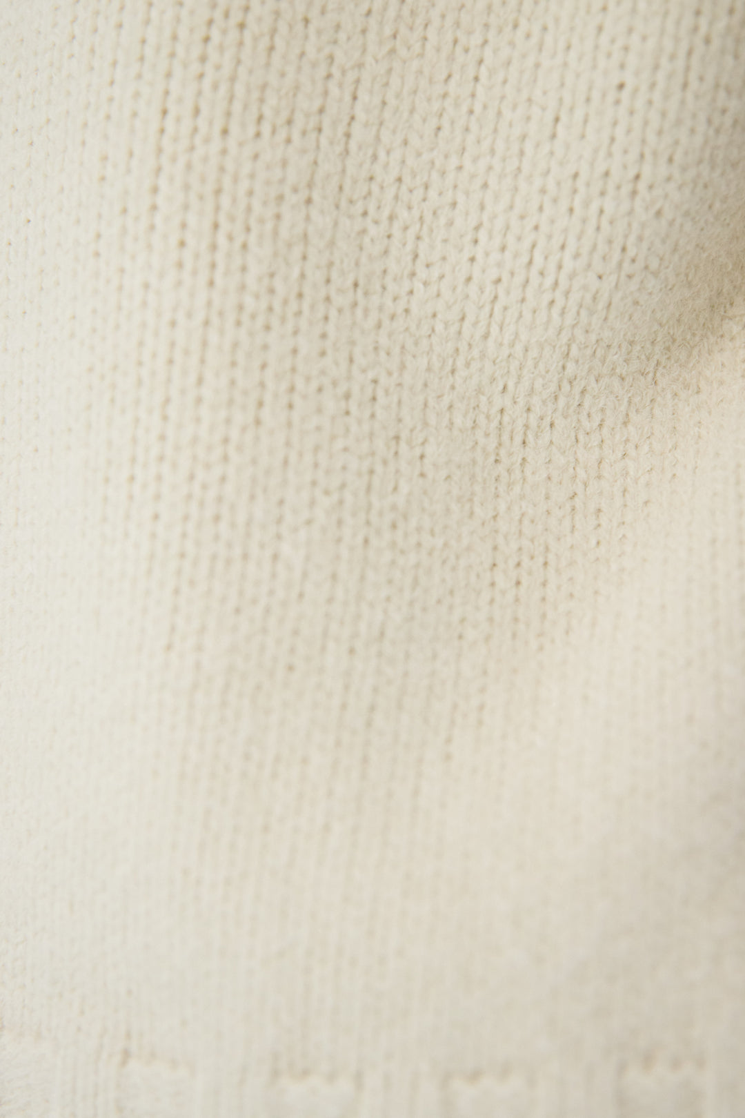 ラグランスリーブハーフジップニット