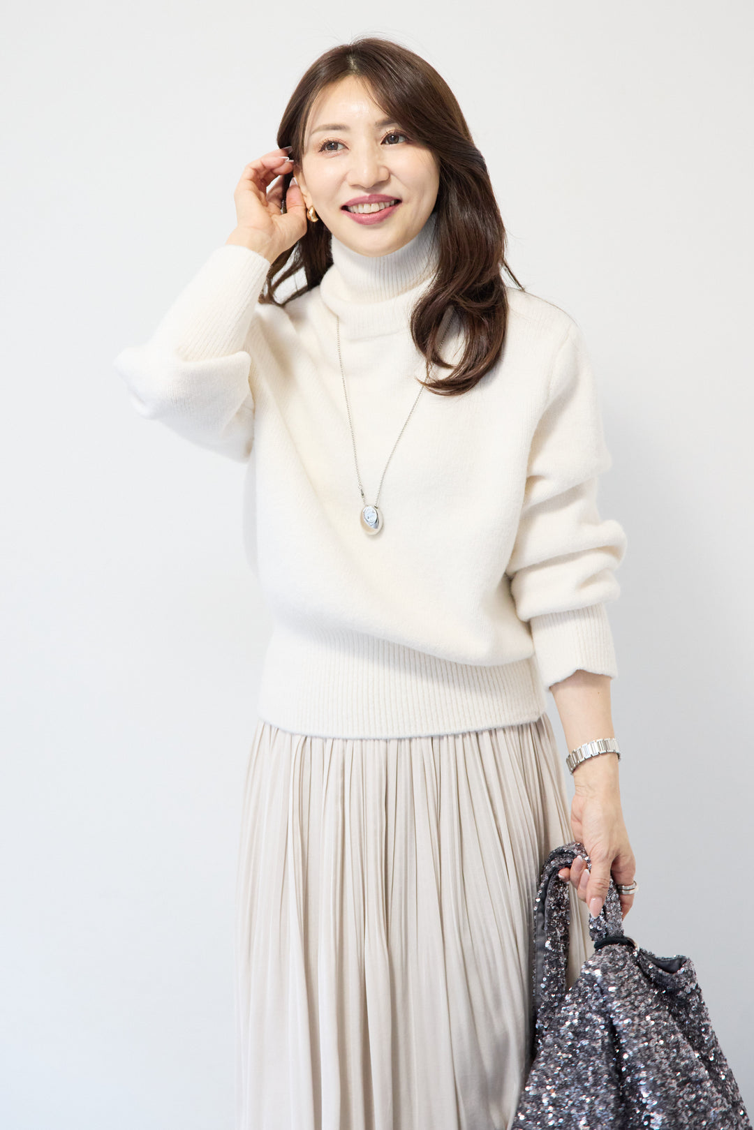 ライトウォームタートルネックニット