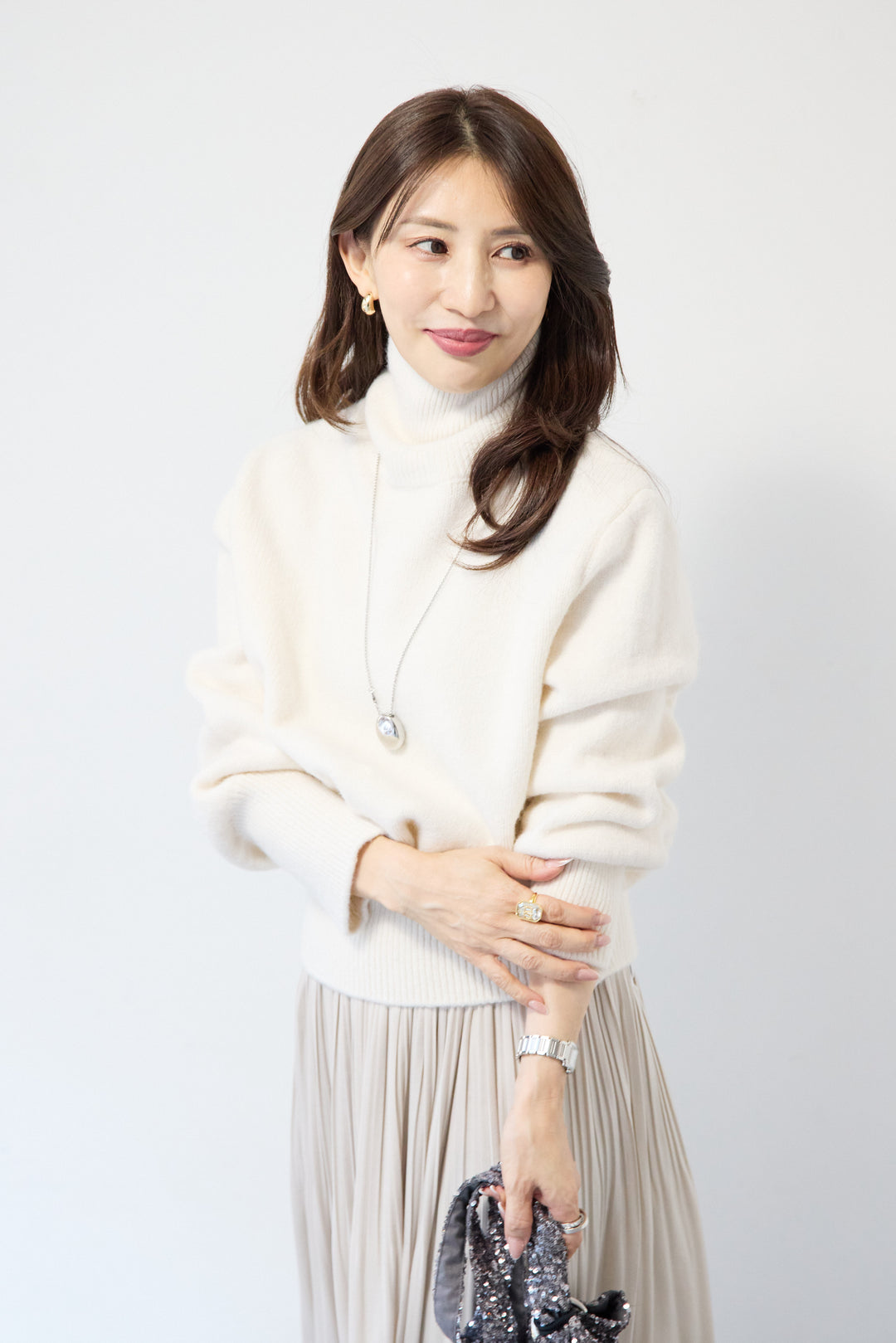 ライトウォームタートルネックニット