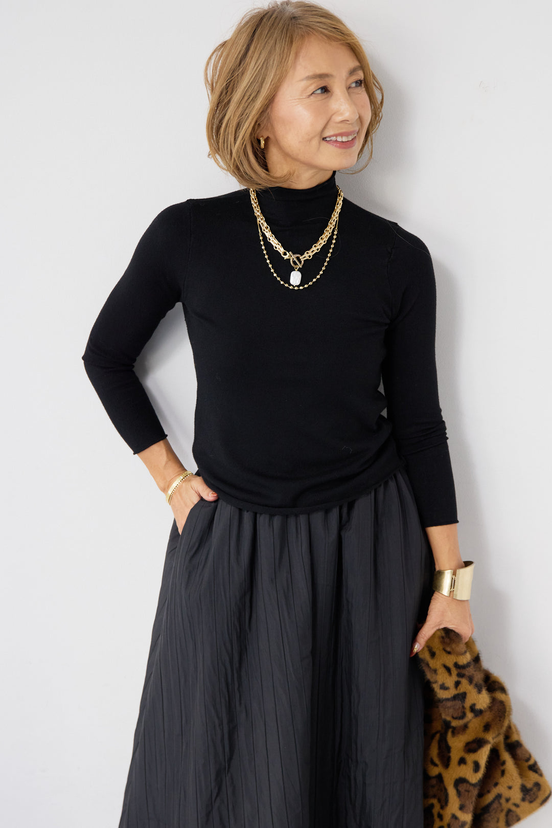 ロールエッジタートルニット