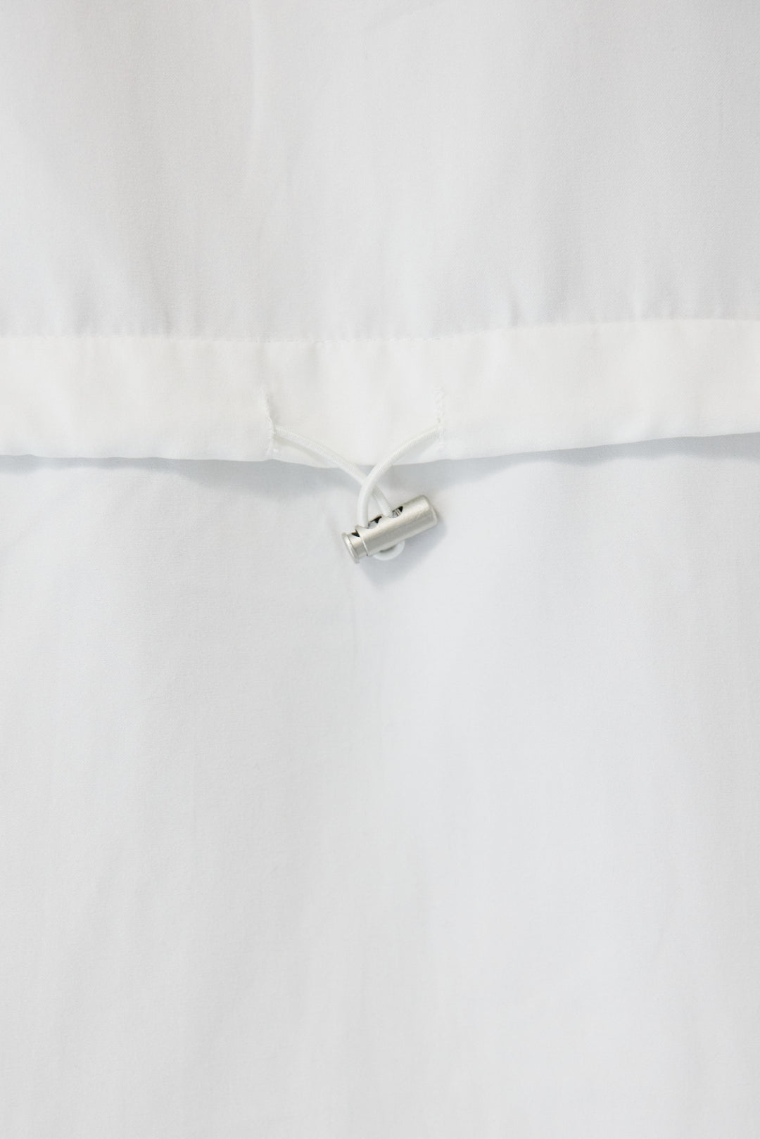 バックドロストシャツ