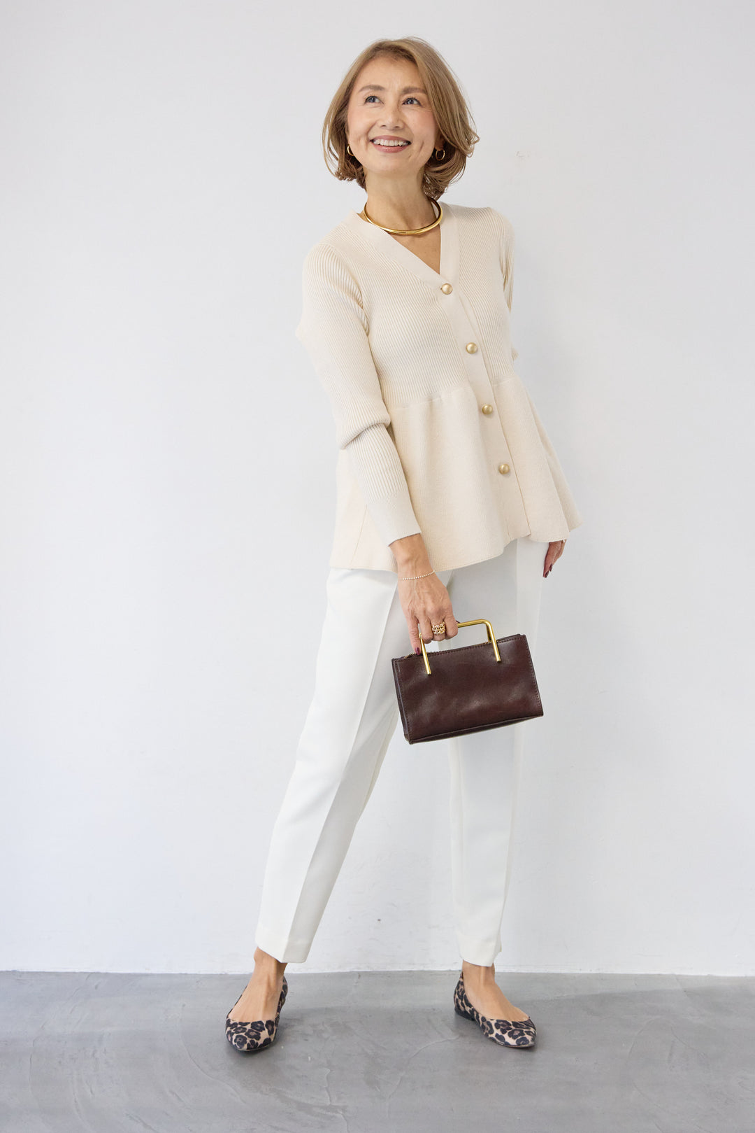 ゴールドボタンペプラムカーディガン