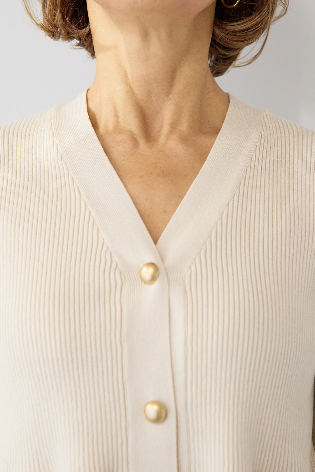 ゴールドボタンペプラムカーディガン