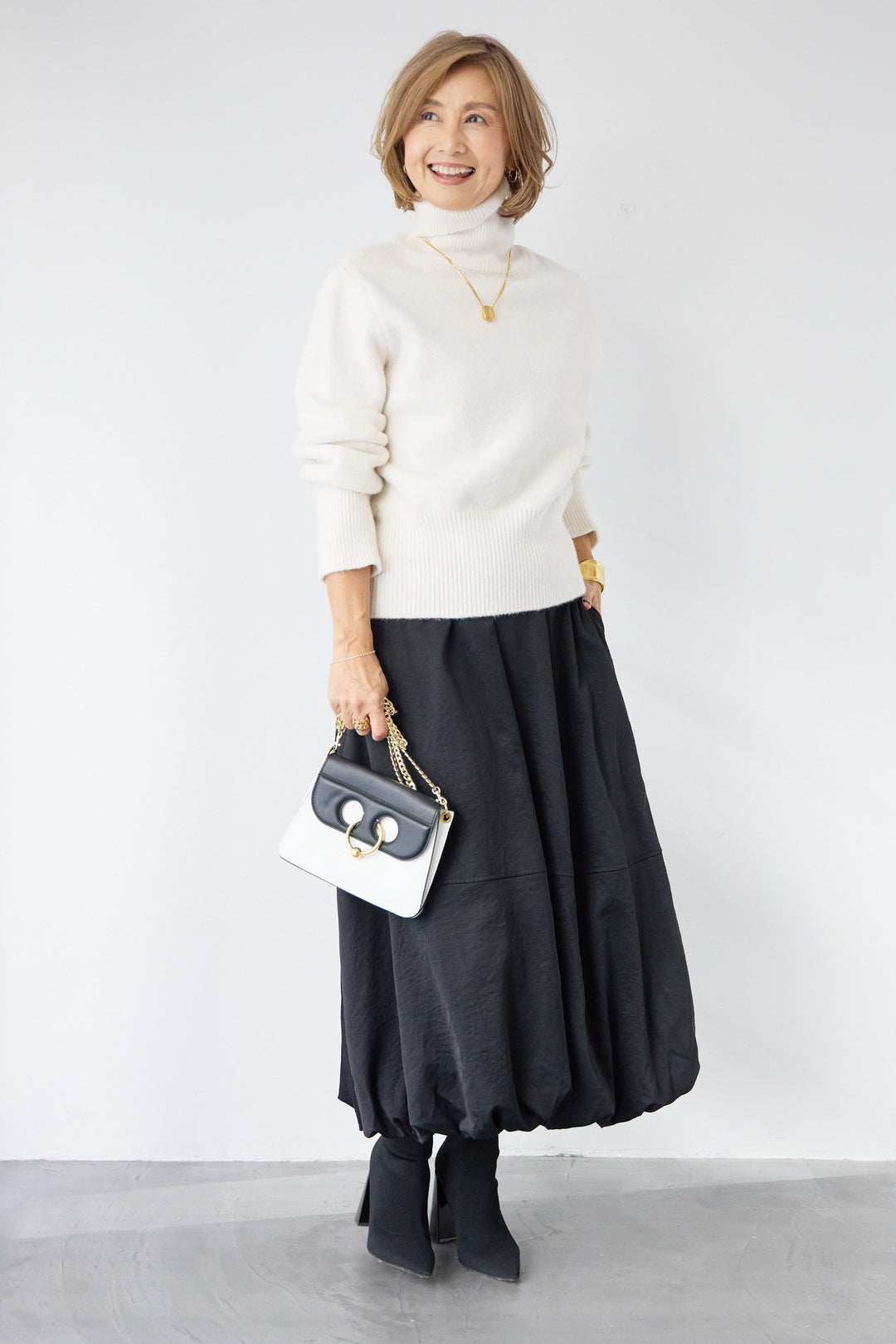 ライトウォームタートルネックニット